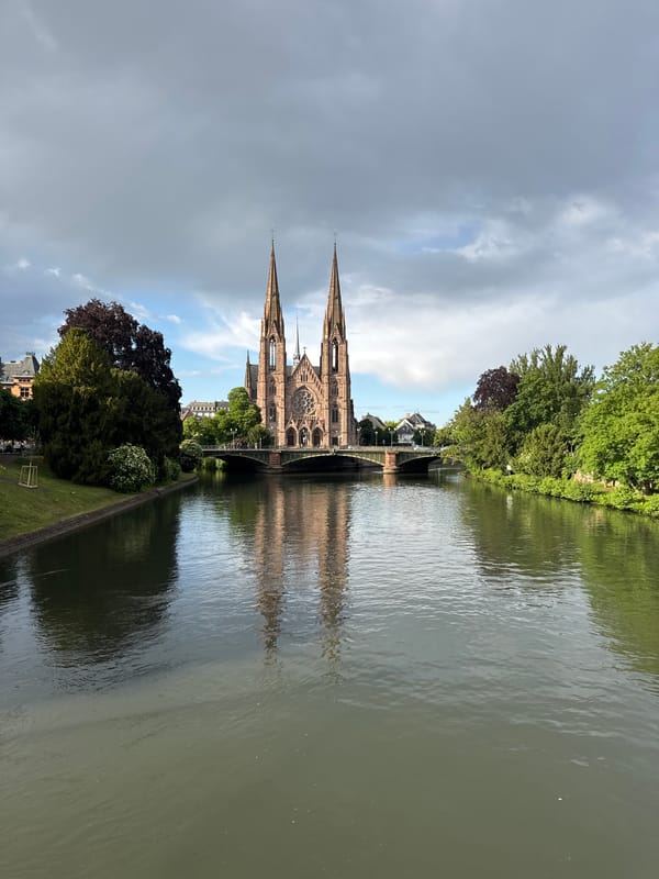 Tourist captures Strasbourg landmarks and reflections in brief afternoon walk