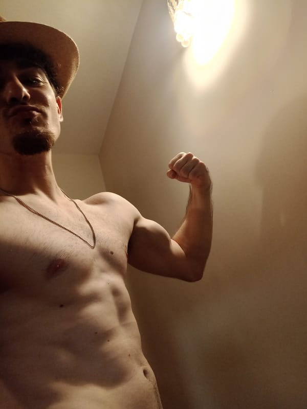 Young man takes multiple selfies in Parvomay home