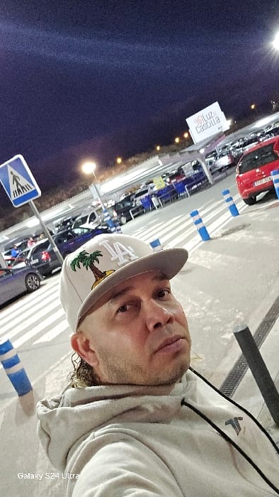 Man photographed in commercial parking area in Segovia