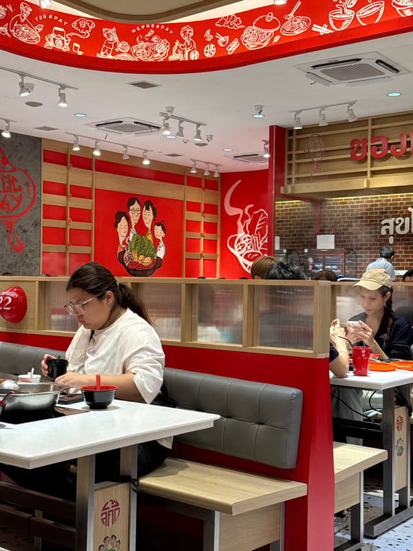 Robot server delivers food in Bangkok restaurant