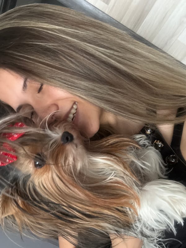 Person shares intimate moment with Yorkshire Terrier in Sliven