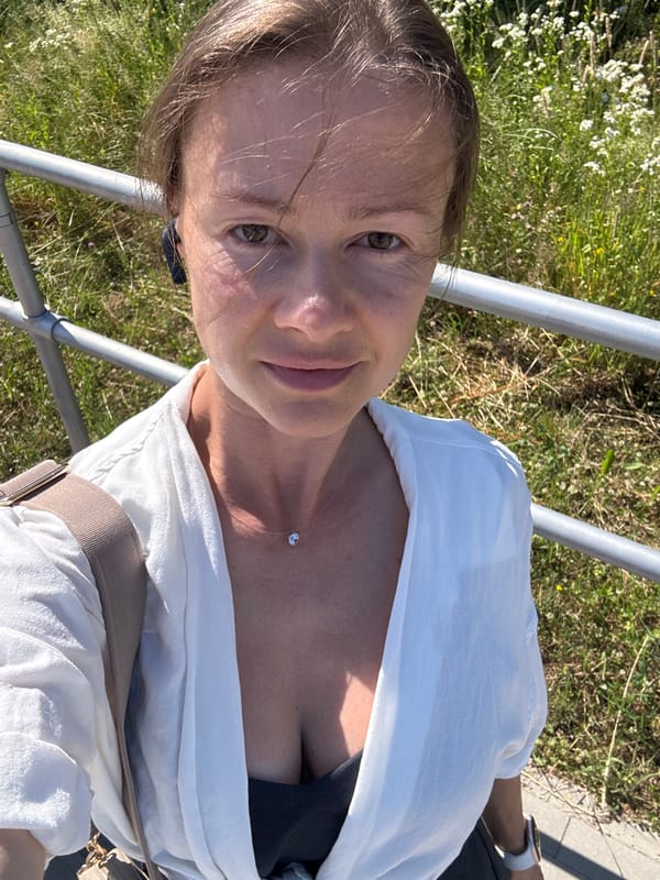 Casual outdoor selfie in Riga on a summer afternoon.