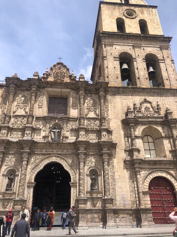 Media gathering at La Paz auditorium near historic basilica