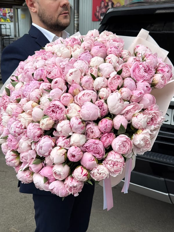 Almaty residents document flower delivery and playful puppy encounters