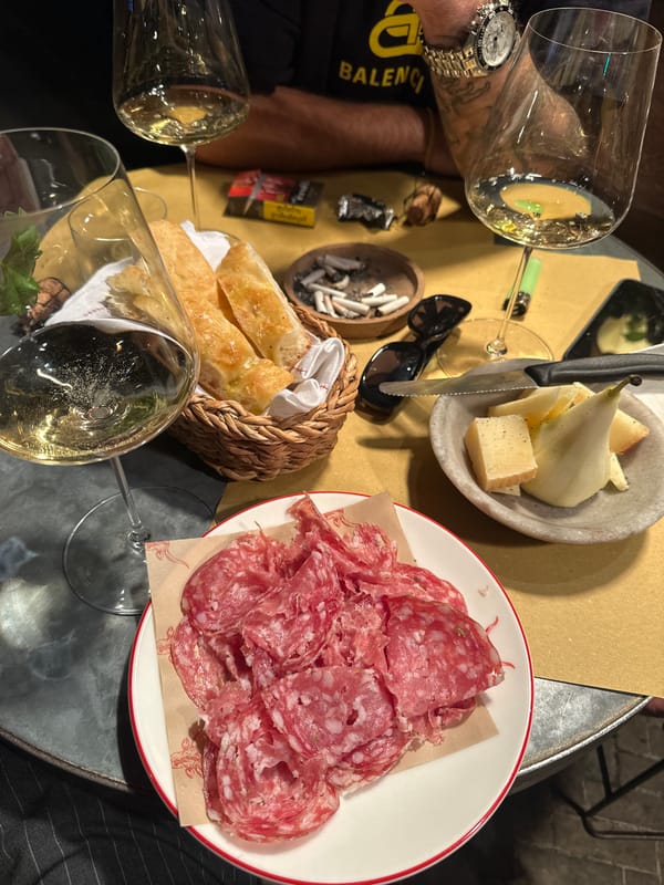 Evening dining scene captured in London with wine glasses