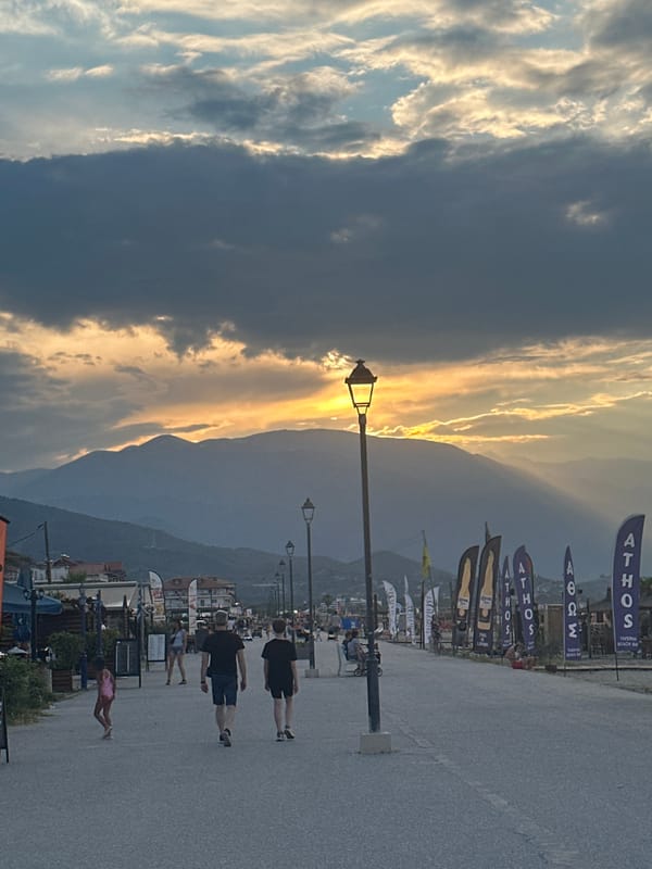 Golden hour light over the Neoi Poroi waterfront, Greece