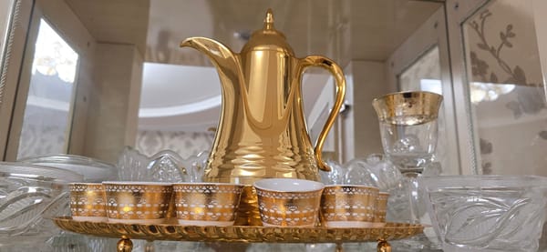 Gold tableware, flowers, and street details in Tashkent