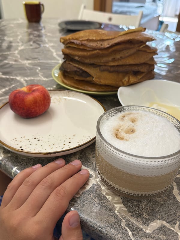 Quiet domestic morning in Sochi with breakfast, a cat, and family