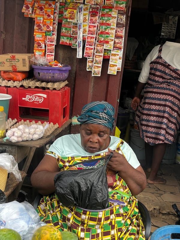 Daily market activity captured across Accra street vendors