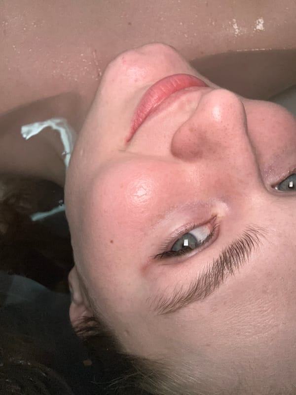 Woman documents personal care routine in Kazan bathroom