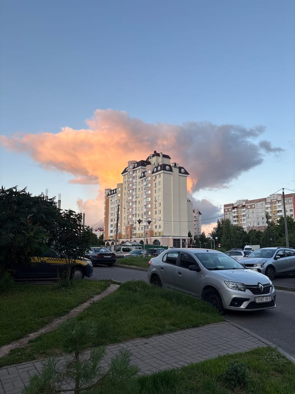Vitsebsk residential blocks at dusk, construction nearby