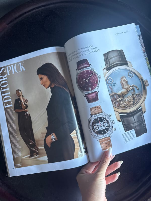 Person reads magazines, tends orchid in Kuta Selatan