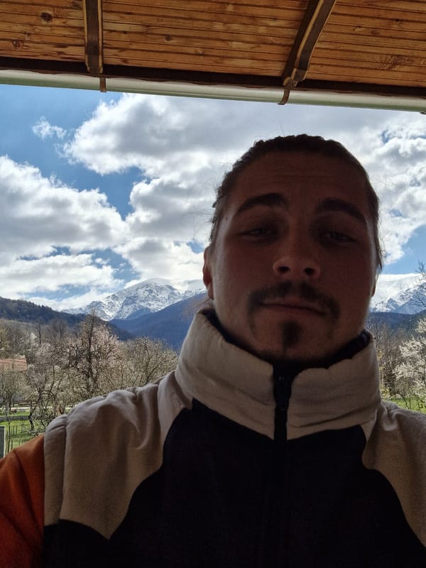 Man takes mountain selfie in Apriltsi, Bulgaria