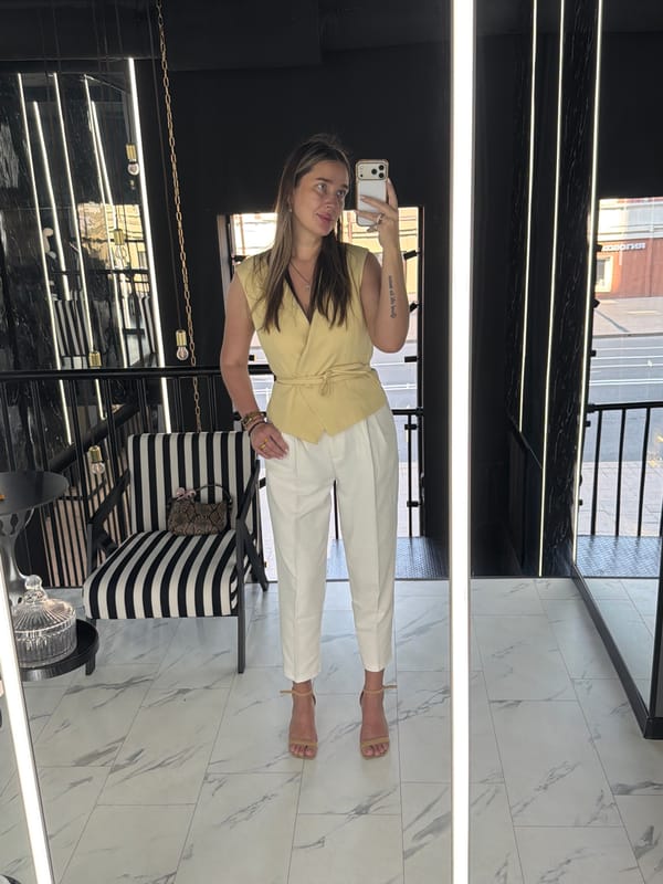 Woman takes morning selfie in well-lit indoor space