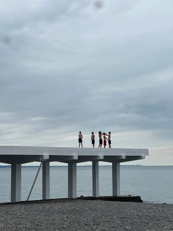 Hanging on a white pier's edge in Sokhumi, Abkhazia