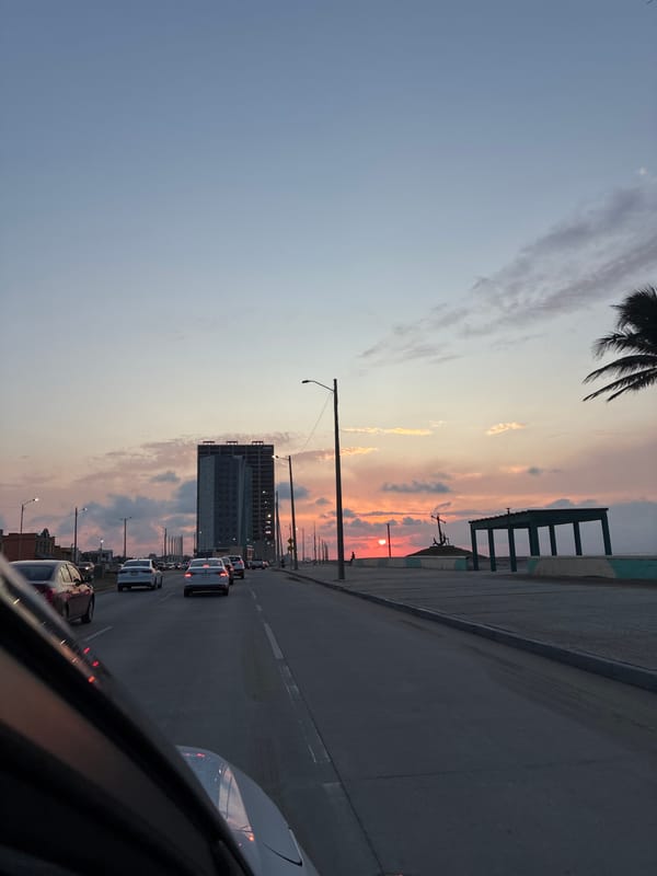 Sunset street view shows construction in Coatzacoalcos, Mexico