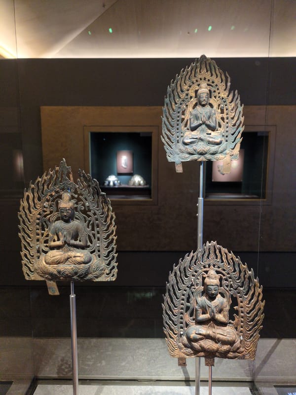 Museum visitors document Buddhist artifacts, pottery in Gyeongju morning tour