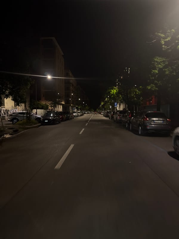 Quiet nighttime street scene captured in Milan