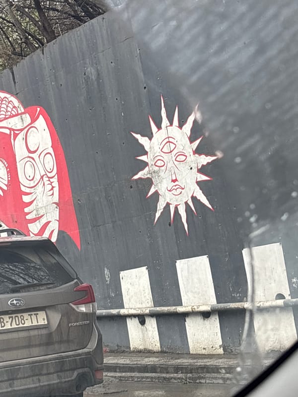 Morning street scenes documented across central Tbilisi during rain