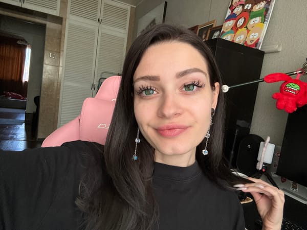Woman photographs herself, pets cat in Reutov home