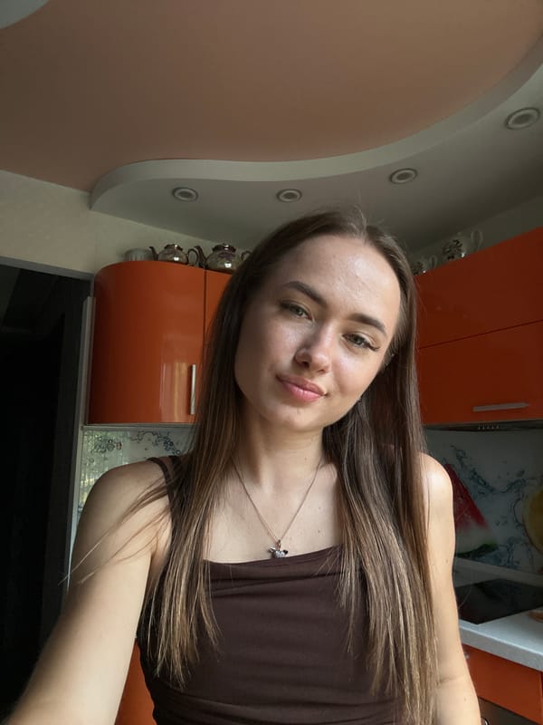 Selfie series in an orange-cabinet kitchen
