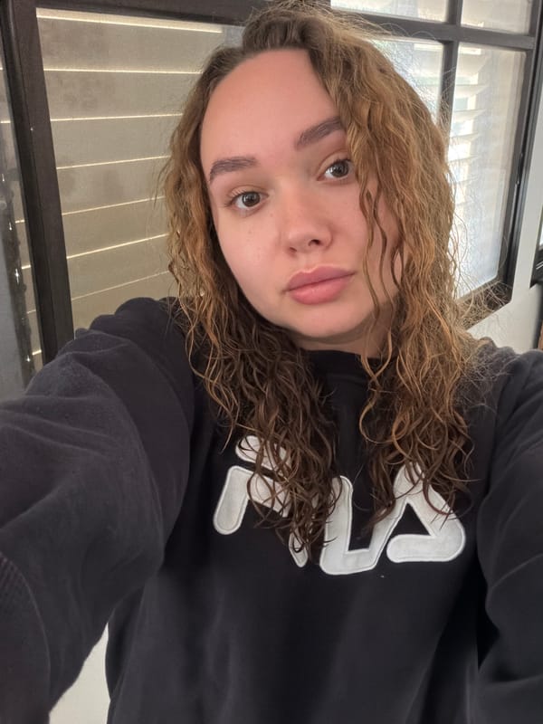 Woman documents morning skincare routine in Ramat Gan apartment