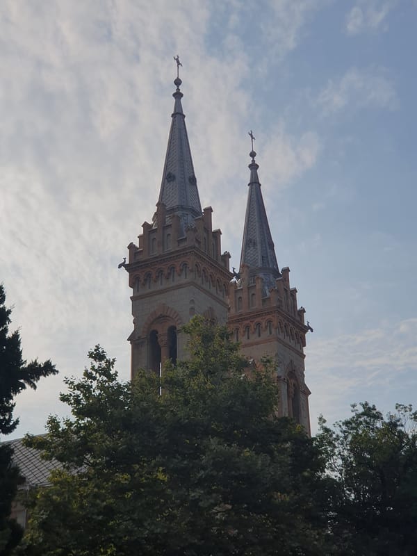 Church spires and cuddling cats on a Batumi morning