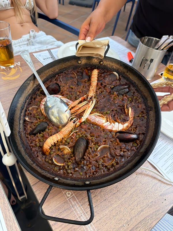 Paella lunch at a coastal restaurant in Palamós