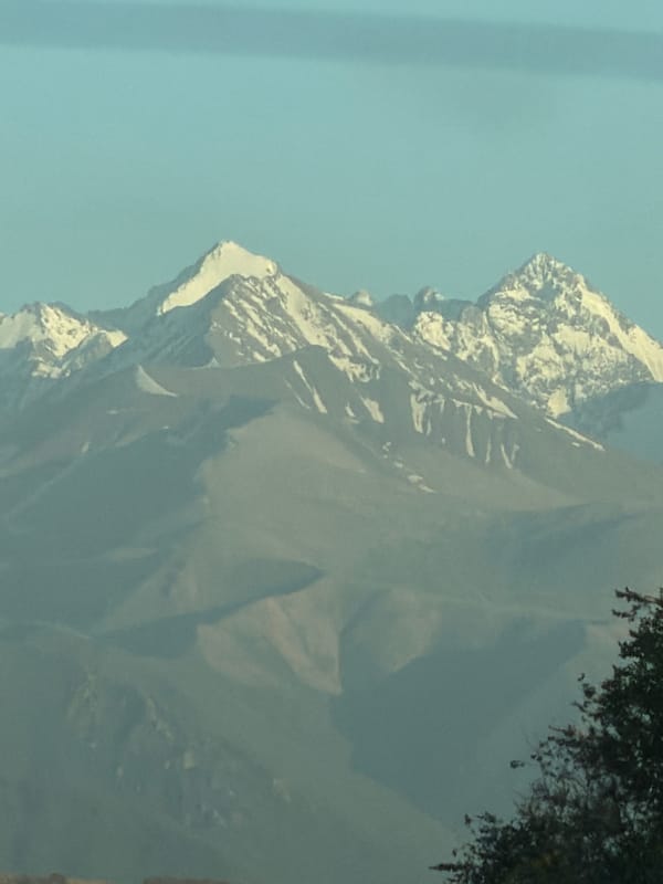 Snow-capped mountain views and ornate lanterns across one afternoon