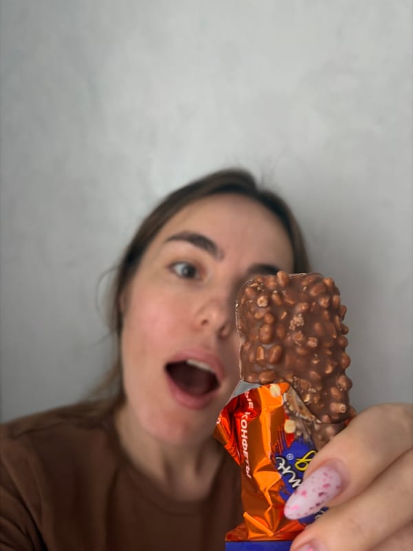Woman holds chocolate bar in Neftekamsk, Russia