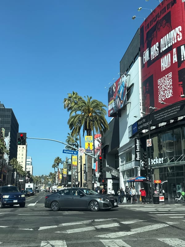 Spider-Man performers spotted at Hollywood Boulevard intersection