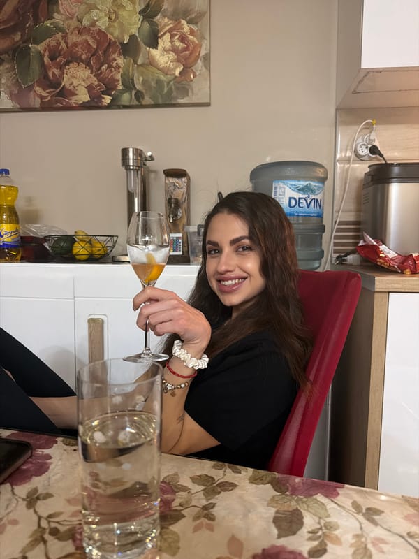 Friends gather for late-night meal in Sandanski kitchen