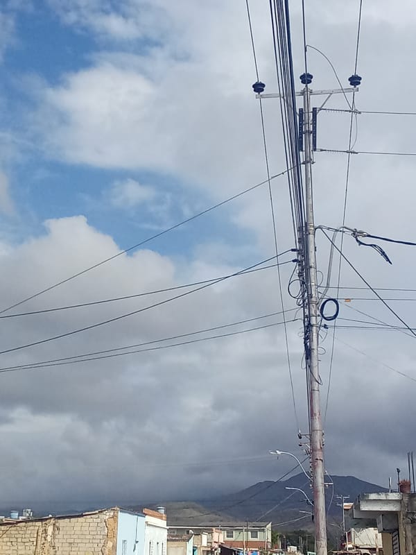 Evening street life documented in Juan Griego, Venezuela
