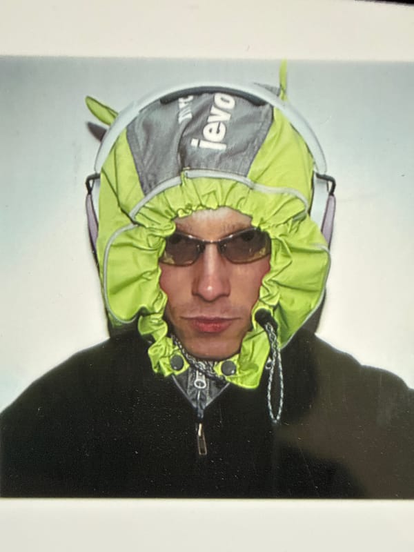 Person spotted in London wearing distinctive 'levo' branded backpack