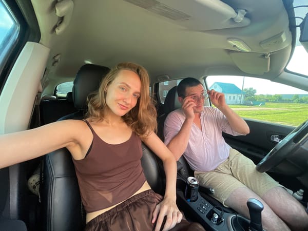 Candid car moments with two people in Kuyeda, Russia
