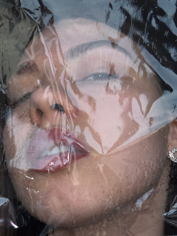 Portrait session with plastic wrap documented in Perm