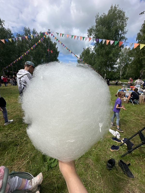 Local outdoor gathering in Yaroslavka with trampolines and fair treats