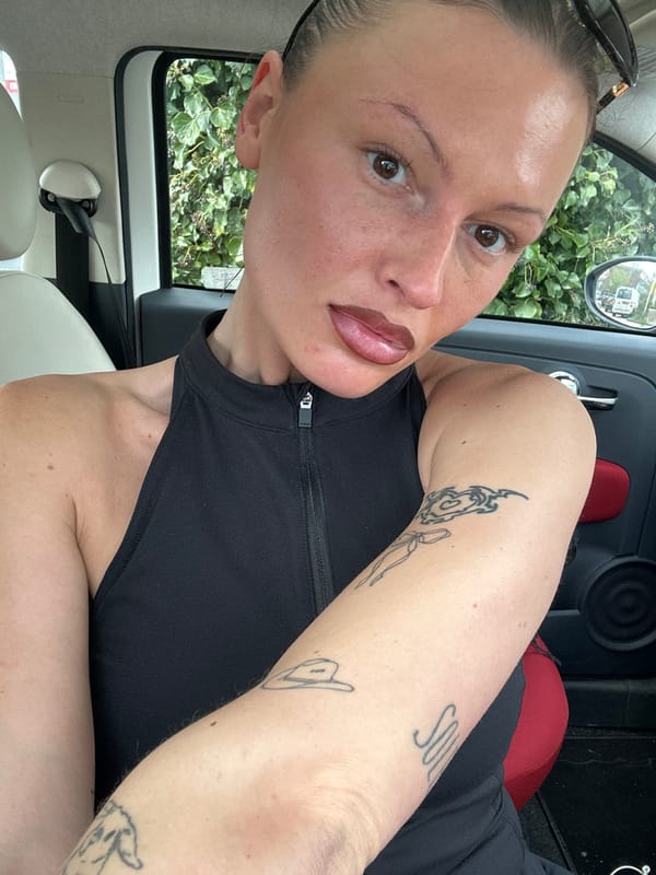 Woman takes selfies, applies makeup in car near Tunbridge Wells
