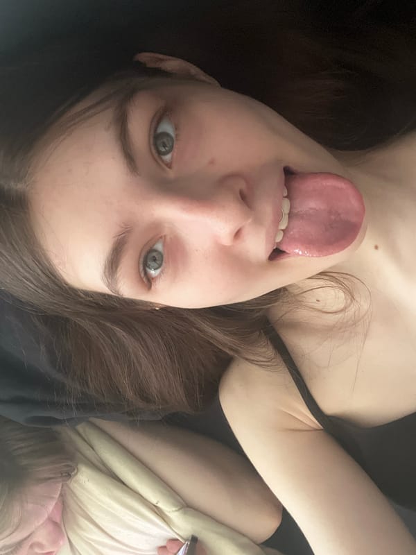 Indoor photographs capture person and cat in Saint Petersburg