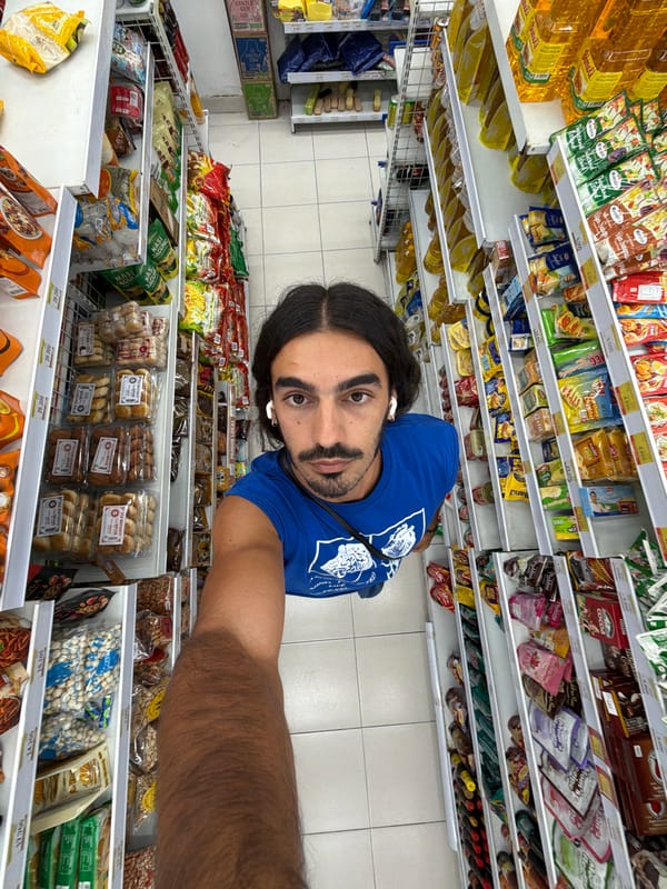 Man documents evening stroll through North Kuta with selfies