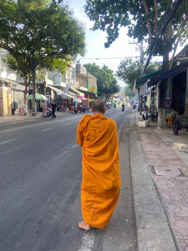 Buddhist monk on foot through Nha Trang streets