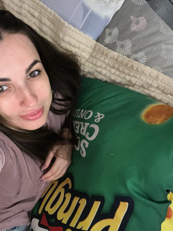Woman documents casual day with selfies, toys, and child
