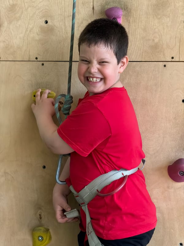 Children practice indoor rock climbing in Izhevsk facility