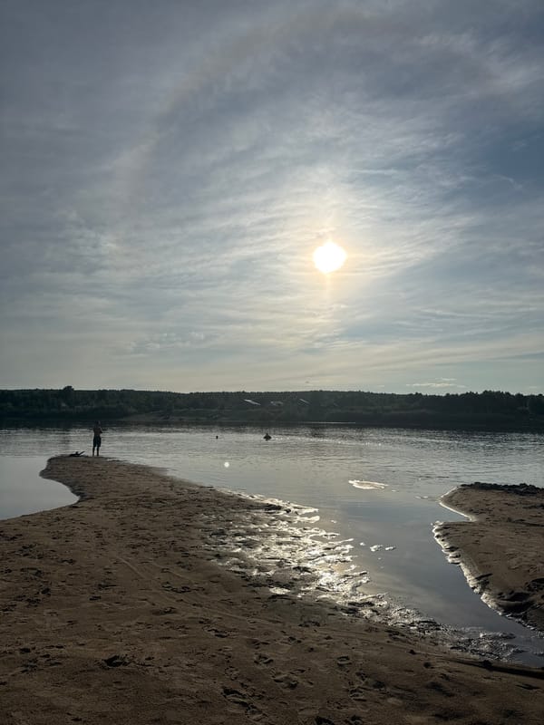 Summer beach hangout on the shores of Ryabinino