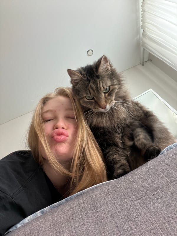 Woman shares quiet moment with tabby cat in Russia