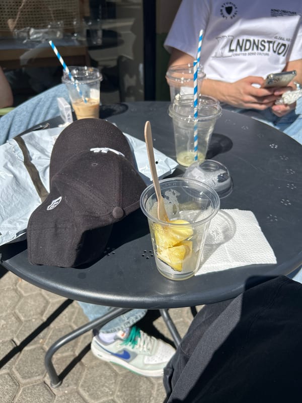 Two plastic cups with striped straws spotted on Sofia table