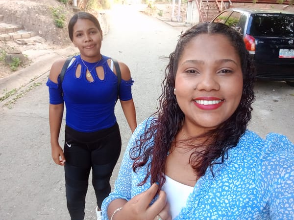 Women pose for group photos in Las Tejerías Venezuela