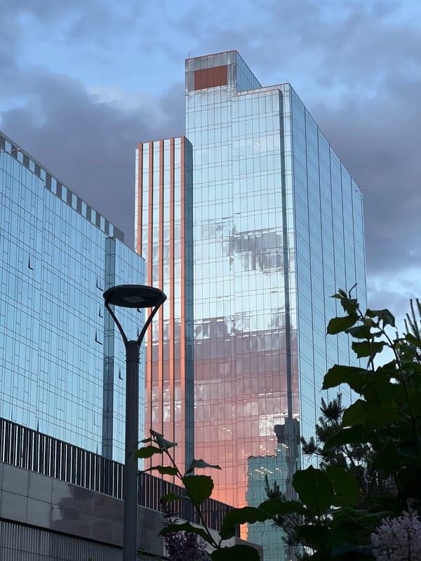 Tourist documents modern Astana architecture during afternoon walkabout