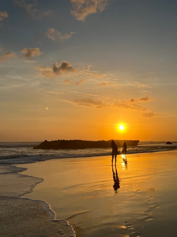 Quiet morning on a North Kuta beach at golden hour