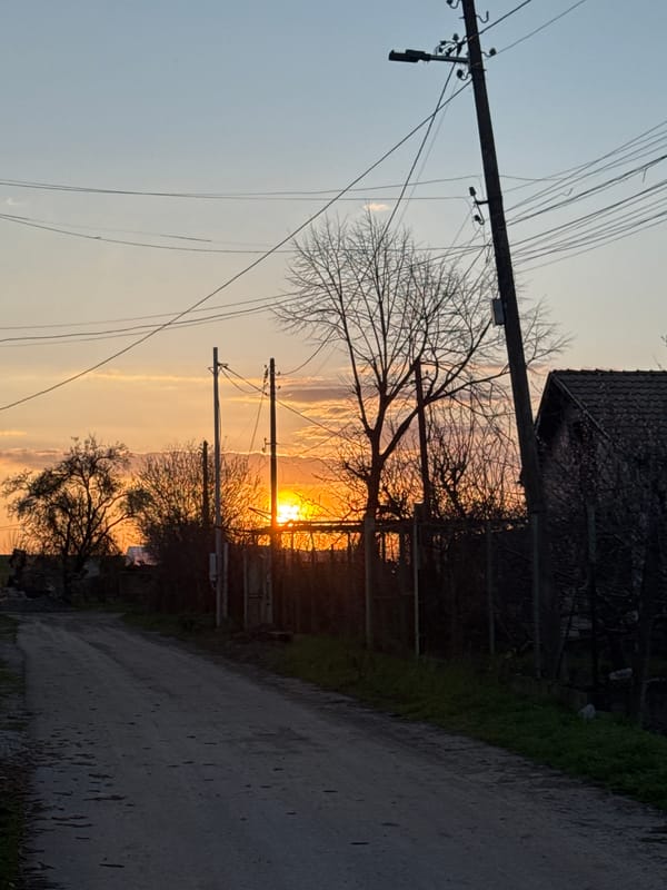 Sunset captured on rural dirt road in Bulgarian village